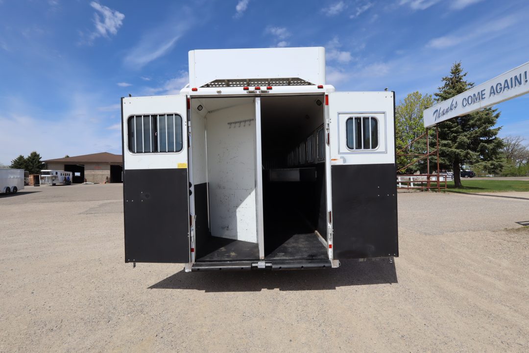 Used 2007 Sundowner 7 Horse Mid-tack Trailer