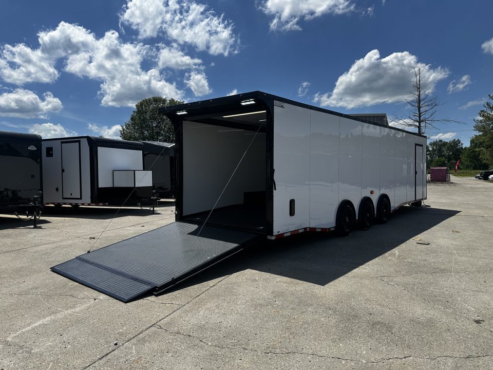 New 2026 Luxe 8.5x32 Race Trailer- Finished Interior- 5200LB Triple Torsion-Bogey Wheels- HD Ramp