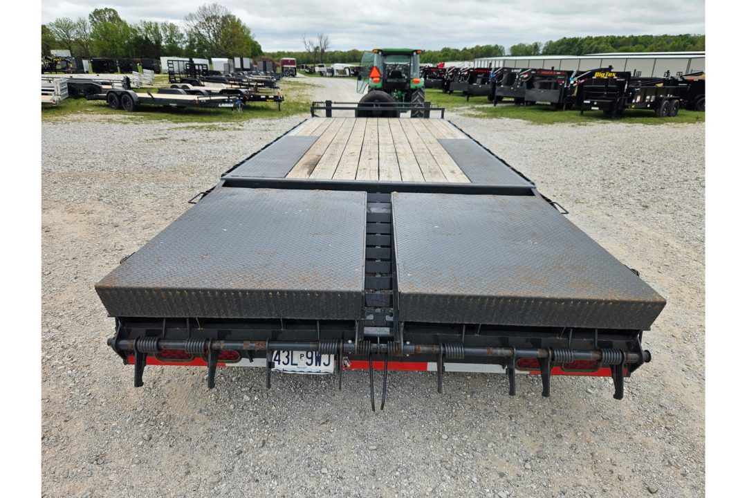 Used 2023 Lamar 102X22 TANDEM 14K DECKOVER W/ TONGUE TOOLBOX SPARE & MAX RAMPS