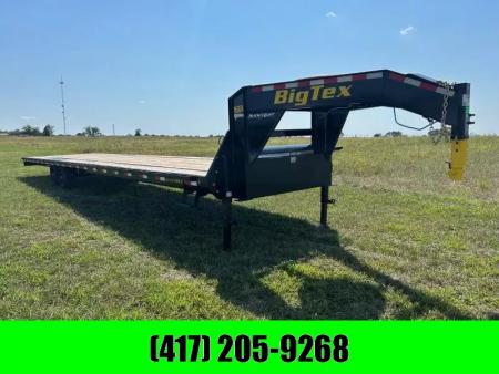 New 2026 Big Tex Trailers 102x40 Tandem 17.5K GN Flatbed w/ Slide In Ramps & Sliding Ratchet Rail