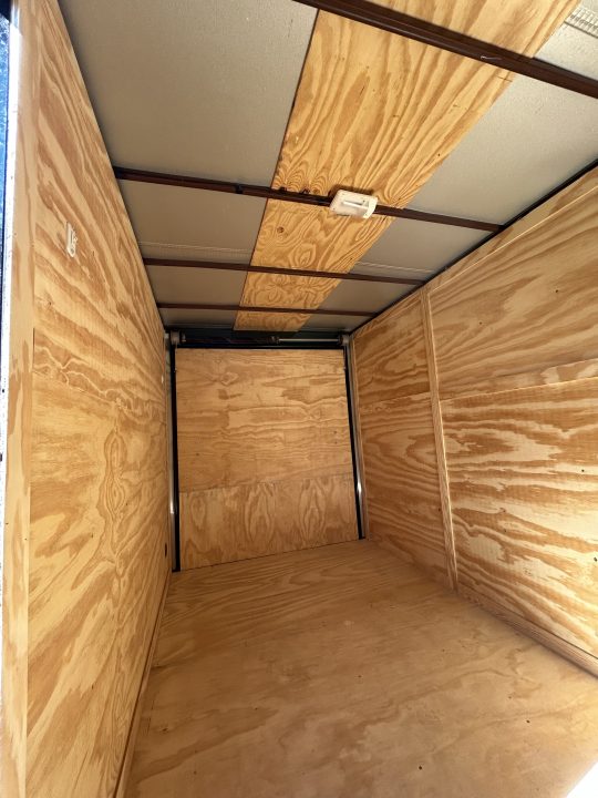 New 2026 Family Trailer 6x12 Tandem Axles Cargo / Enclosed Trailer -Screwless Exterior-Blackout Pkg-Rear Spoiler-HD Axles