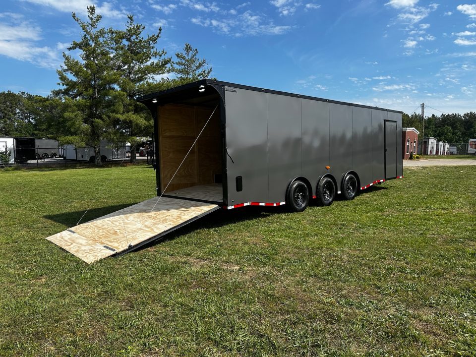 New 2026 Luxe 8.5x28 Car Hauler- 5200LB Triple Torsion Axle--HD RAMP- BOGEY WHEELS-Blackout- Enclosed Car Hauler