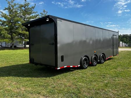New 2026 Luxe 8.5x28 Car Hauler- 5200LB Triple Torsion Axle--HD RAMP- BOGEY WHEELS-Blackout- Enclosed Car Hauler