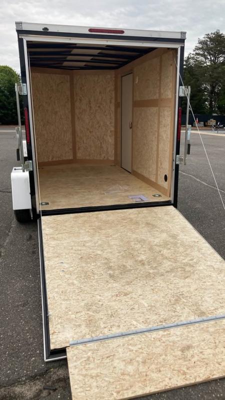New 2026 Wells Cargo 6x10 Cargo / Enclosed Trailer