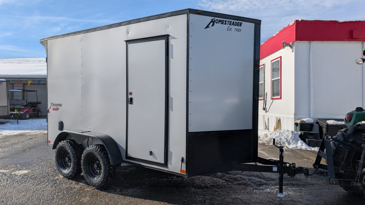 New 2026 Homesteader 7x12 Intrepid "OVERLAND" V-Nose Cargo Trailer w/ Ramp Door