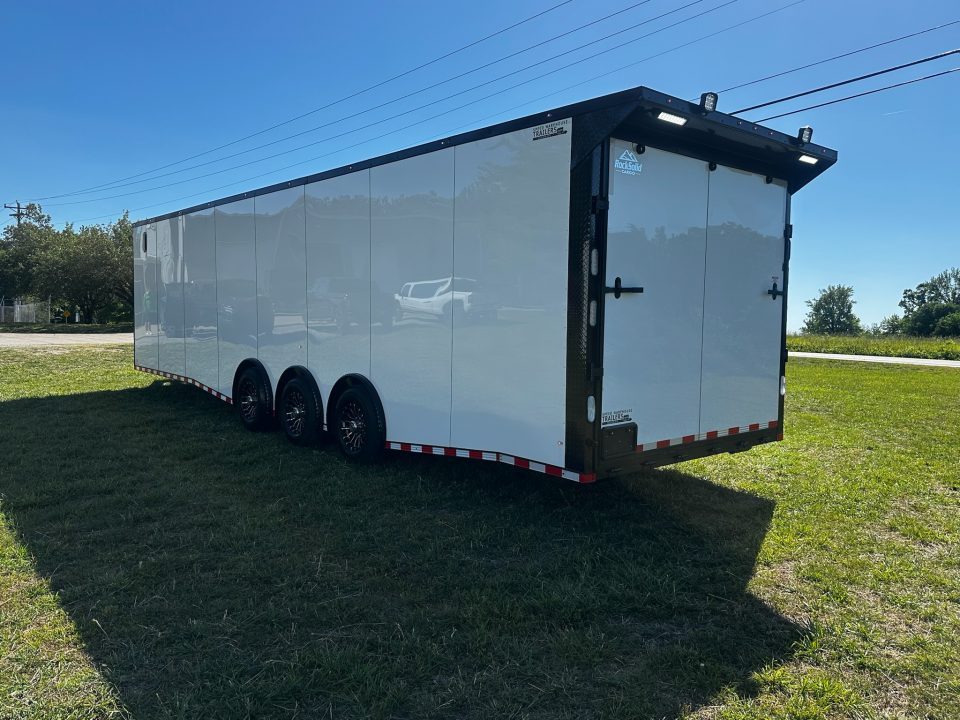 New 2026 Rock Solid Cargo 8.5x32 Race Trailer-Finished Interior-Triple 7000 TORSIONS -HD RAMP-10" BOGEY WHEELS-50 AMP ELECTRIC PACKAGE