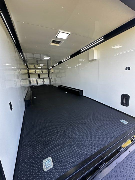 New 2026 Rock Solid Cargo 8.5x32 Race Trailer-Finished Interior-Triple 7000 TORSIONS -HD RAMP-10" BOGEY WHEELS-50 AMP ELECTRIC PACKAGE