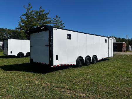 New 2026 Rock Solid Cargo 8.5x32 Race Trailer-Finished Interior-Triple 7000 TORSIONS -HD RAMP-10" BOGEY WHEELS-50 AMP ELECTRIC PACKAGE