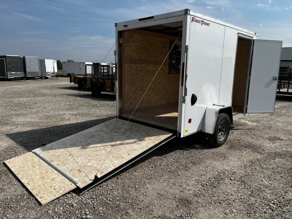 New 2026 Wells Cargo 6x12 FastTrac Deluxe Enclosed Trailer