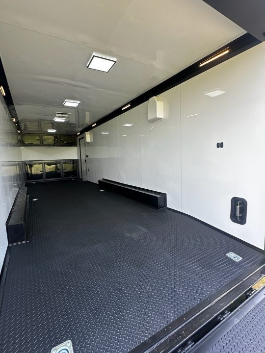 New 2026 Rock Solid Cargo 8.5x28 Race Trailer-Finished Interior-7'6" Interior-Triple 7000 TORSIONS -HD RAMP-AWNING -10" BOGEY WHEELS