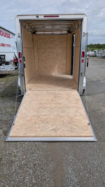 New 2026 LEGEND 6x10 Legend Deluxe Cargo Trailer w/ Ramp Door