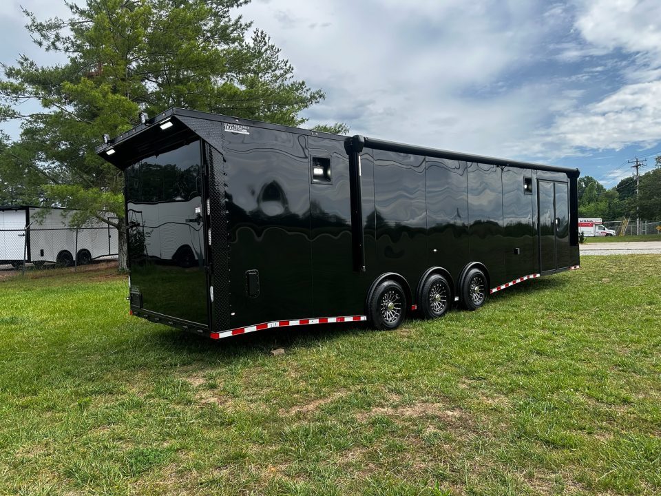 New 2026 Rock Solid Cargo 8.5x32 Race Trailer-Finished Interior-Triple 7000 TORSIONS -Carpet Walls-24ft Awning- Double Doors-E-Track-HD Ramp