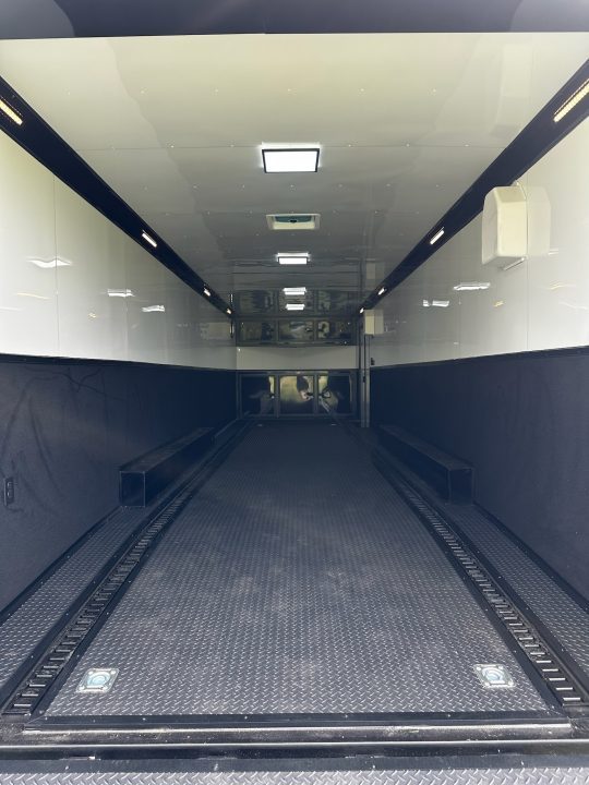 New 2026 Rock Solid Cargo 8.5x32 Race Trailer-Finished Interior-Triple 7000 TORSIONS -Carpet Walls-24ft Awning- Double Doors-E-Track-HD Ramp