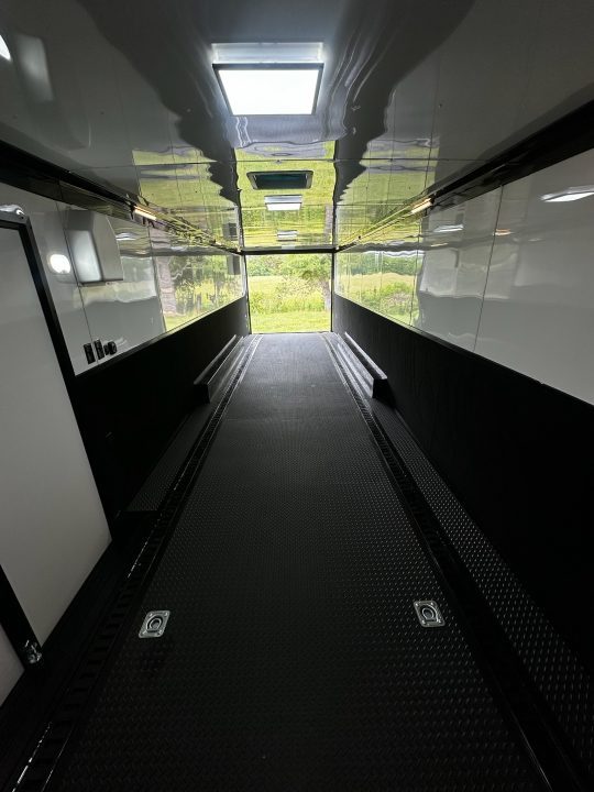 New 2026 Rock Solid Cargo 8.5x32 Race Trailer-Finished Interior-Triple 7000 TORSIONS -Carpet Walls-24ft Awning- Double Doors-E-Track-HD Ramp