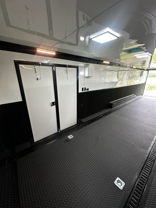 New 2026 Rock Solid Cargo 8.5x32 Race Trailer-Finished Interior-Triple 7000 TORSIONS -Carpet Walls-24ft Awning- Double Doors-E-Track-HD Ramp