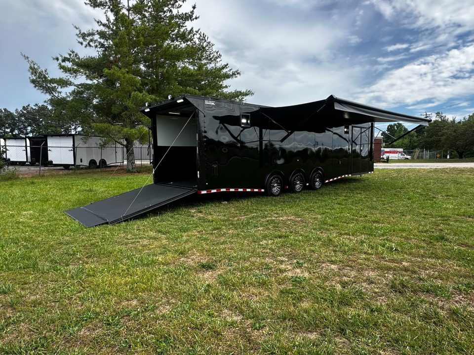New 2026 Rock Solid Cargo 8.5x32 Race Trailer-Finished Interior-Triple 7000 TORSIONS -Carpet Walls-24ft Awning- Double Doors-E-Track-HD Ramp