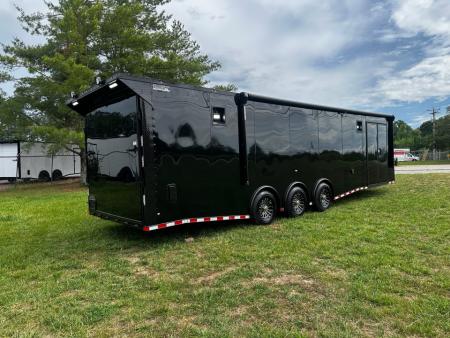 New 2026 Rock Solid Cargo 8.5x32 Race Trailer-Finished Interior-Triple 7000 TORSIONS -Carpet Walls-24ft Awning- Double Doors-E-Track-HD Ramp