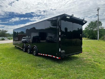 New 2026 Rock Solid Cargo 8.5x32 Race Trailer-Finished Interior-Triple 7000 TORSIONS -Carpet Walls-24ft Awning- Double Doors-E-Track-HD Ramp