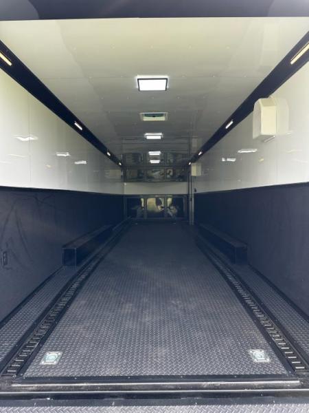 New 2026 Rock Solid Cargo 8.5x32 Race Trailer-Finished Interior-Triple 7000 TORSIONS -Carpet Walls-24ft Awning- Double Doors-E-Track-HD Ramp