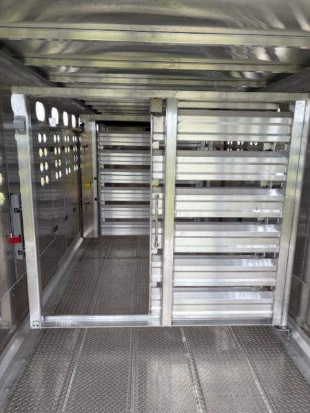New 2027 EBY 6'11x24 Tandem 14K Livestock Trailer W/ Punch Sides & Floating Front Gate