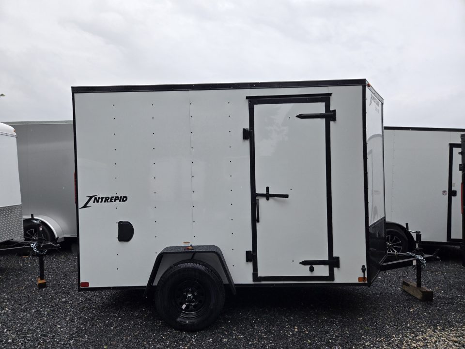 New 6 x 10 Homesteader Intrepid V-Nose Cargo Trailer, 3k *White w/ Black Out Pkg, Ramp Door Pkg & 6" Extra Height