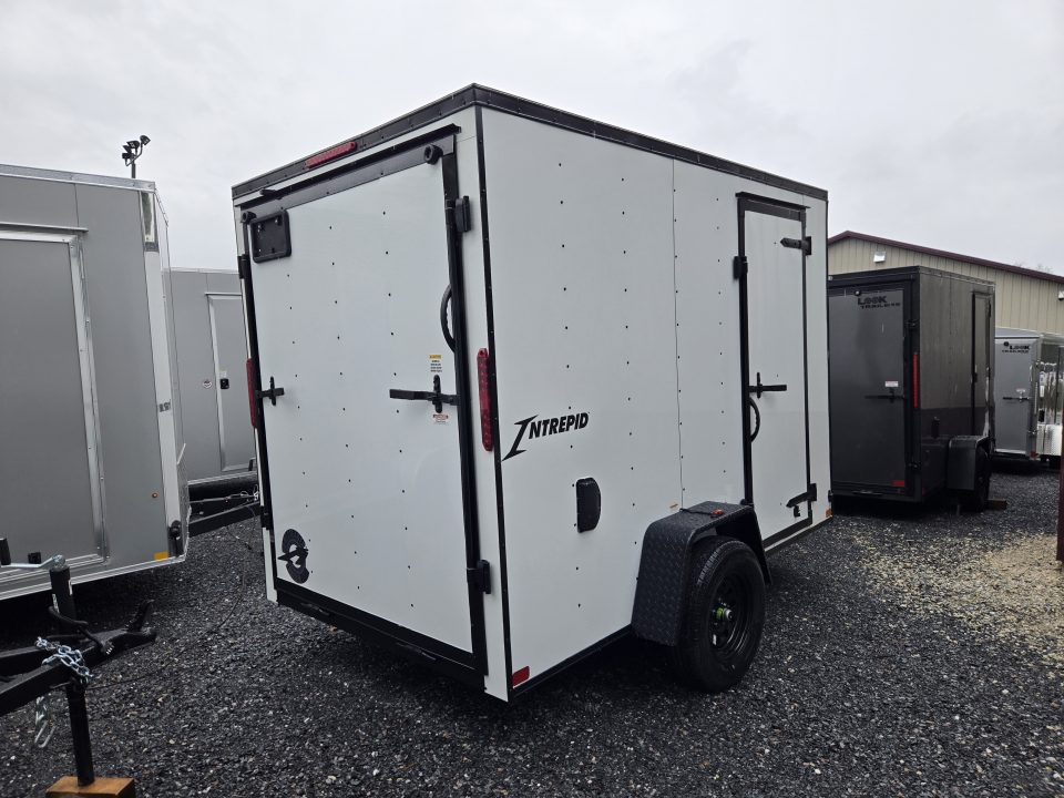 New 6 x 10 Homesteader Intrepid V-Nose Cargo Trailer, 3k *White w/ Black Out Pkg, Ramp Door Pkg & 6" Extra Height