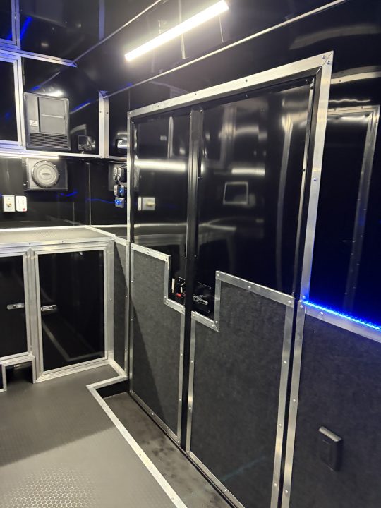 New 2026 Haulmark 34 Bathoom Race Trailer, Sliding Rear Glass Doors, Air Prep PKG, Awning, 2 A/C, Polycor, Insulated, Window, 54" ALX Slide Out Step, A/C + Heat