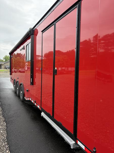 New 2026 Haulmark 34 Bathoom Race Trailer, Sliding Rear Glass Doors, Air Prep PKG, Awning, 2 A/C, Polycor, Insulated, Window, 54" ALX Slide Out Step, A/C + Heat