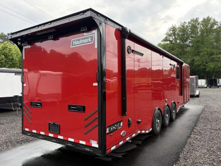 New 2026 Haulmark 34 Bathoom Race Trailer, Sliding Rear Glass Doors, Air Prep PKG, Awning, 2 A/C, Polycor, Insulated, Window, 54" ALX Slide Out Step, A/C + Heat