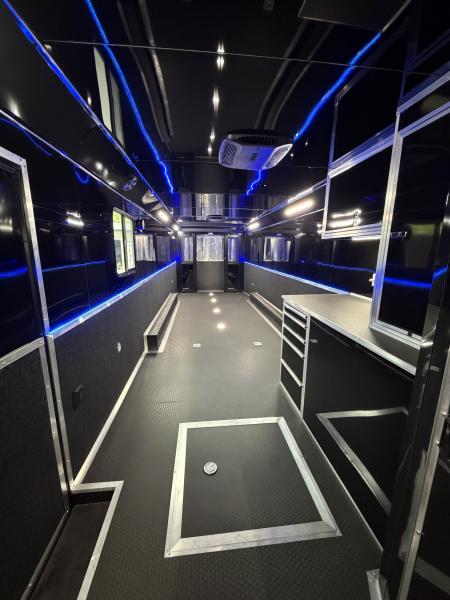 New 2026 Haulmark 34 Bathoom Race Trailer, Sliding Rear Glass Doors, Air Prep PKG, Awning, 2 A/C, Polycor, Insulated, Window, 54" ALX Slide Out Step, A/C + Heat