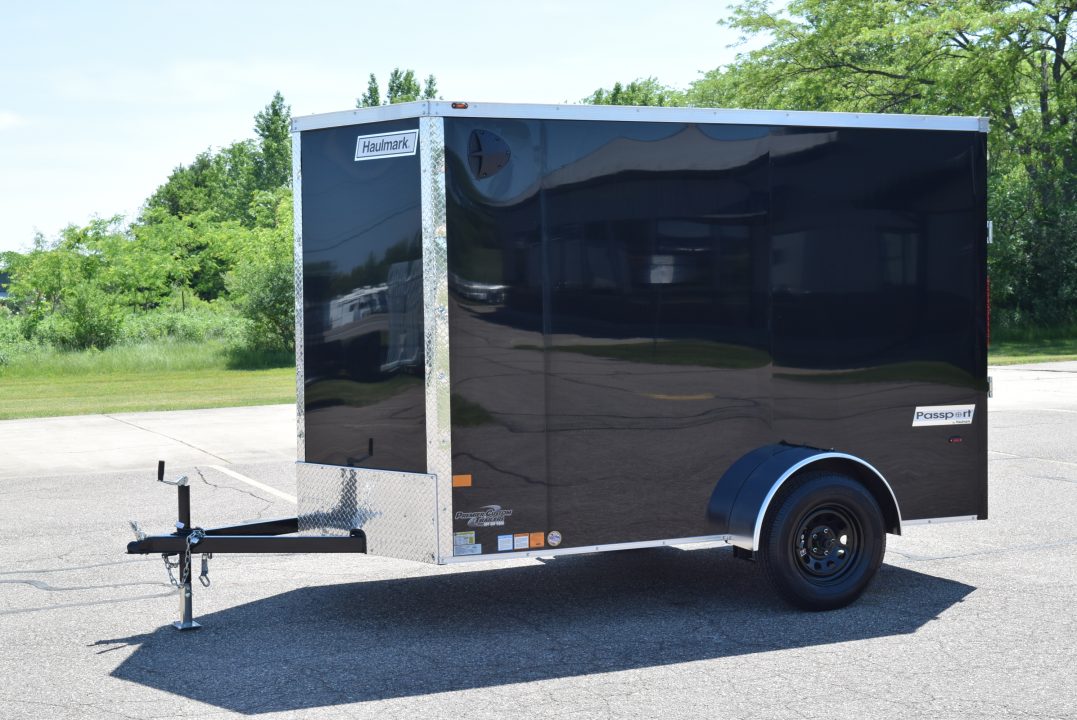 New 2026 Haulmark Passport Deluxe 6x10 Cargo / Enclosed Trailer