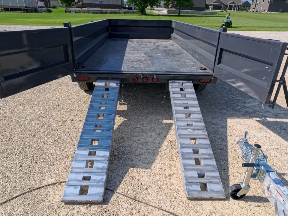 New 2026 Iron Bull 83 x 14 DWB Dump Trailer with 2) 7K GVWR Straight Axles and 2) Fwd. Adj. Electric Brakes, Slide-In Aluminum Ramps and 10 Ply Tires