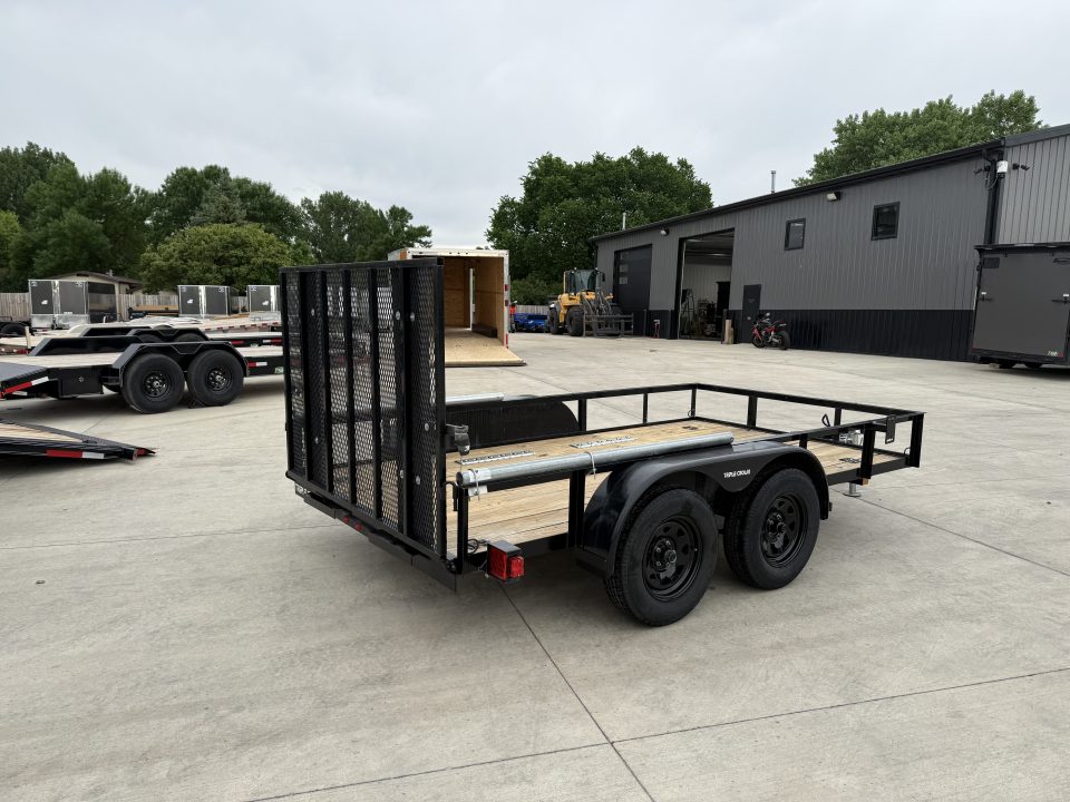 Used 2023 Triple Crown 77"x12' 2-3500lb axles = 7K Railside Utility with lift helpers springs