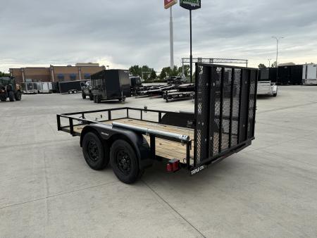 Used 2023 Triple Crown 77"x12' 2-3500lb axles = 7K Railside Utility with lift helpers springs