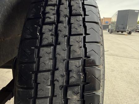 Used 2023 Triple Crown 77"x12' 2-3500lb axles = 7K Railside Utility with lift helpers springs