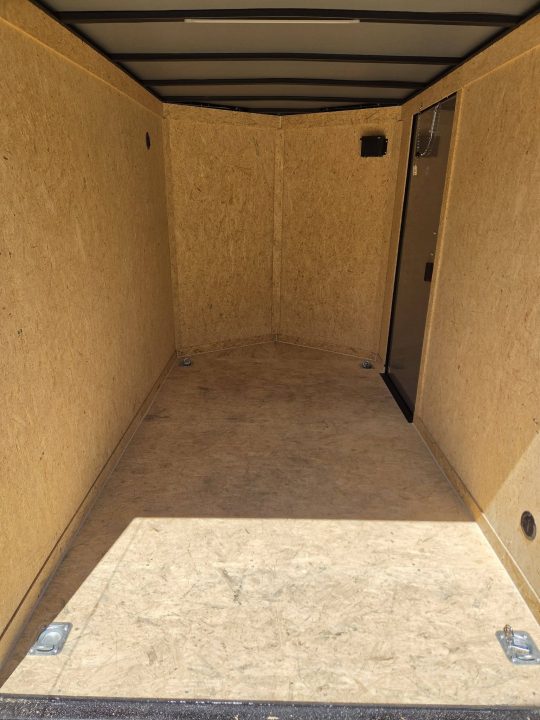 New 2026 Covered Wagon Trailers 6x10 cargo trailer with black out package and rear ramp door Cargo / Enclosed Trailer