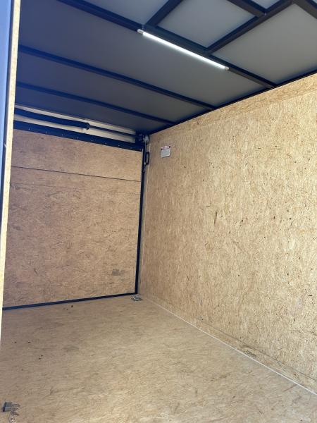 New 2026 COVERED WAGON 6X12 TANDEM AXLE ENCLOSED TRAILER WITH BLACKOUT KIT