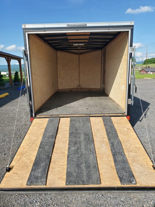 Used 2023 Pace American 7 x 14 Outback DLX Flat Top V-Nose 7K Enclosed Trailer