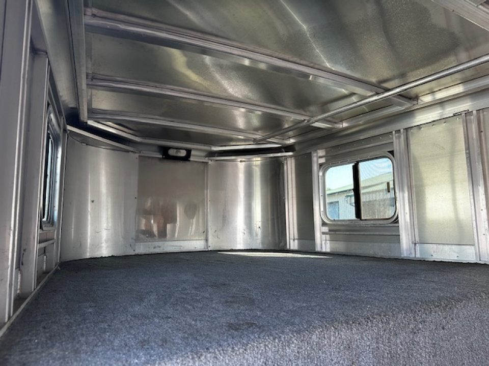 Used 2014 Exiss Trailers 7400 GN 4-H Slant Horse Trailer