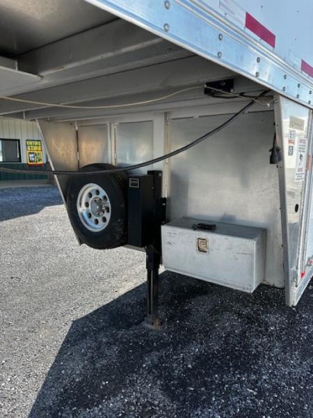 Used 2014 Exiss Trailers 7400 GN 4-H Slant Horse Trailer