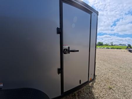 New 2026 Stealth Trailers 6 x 12 x 6.6 Cobra Flat Top, Spring Tandem Axle, 24" Slant Wedge, Silver w/ Blackout Package, 7k GVWR