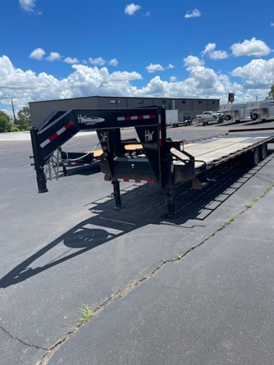 Used 2024 H&W 8.5x32 GN flatbed Equipment Trailer