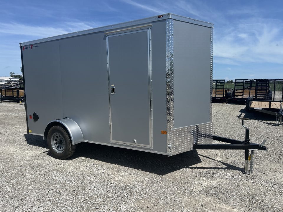 New 2026 Wells Cargo 6x12 3K FastTrac Deluxe Enclosed Trailer