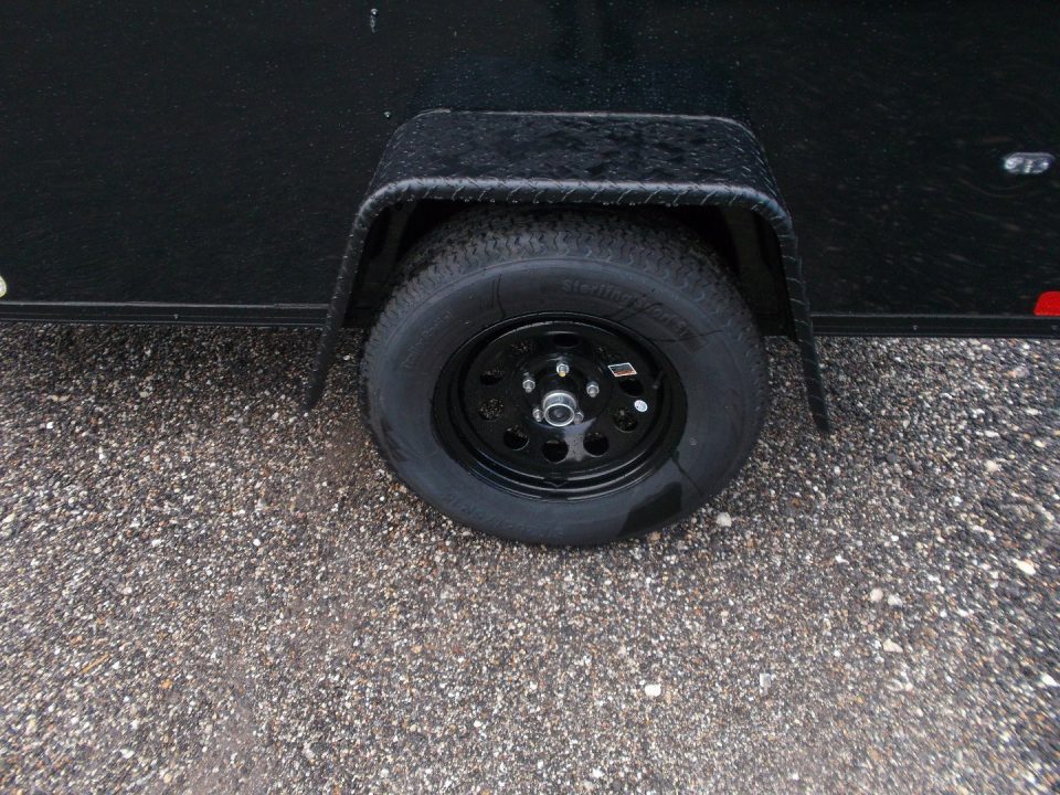 New 2026 Covered Wagon Trailers 5x8 Cargo Trailer / Enclosed Trailer / Ramp / Side Door / .030 Black Semi-Screwless Exterior / Bed Lined Tongue and Frame / Black Out Package