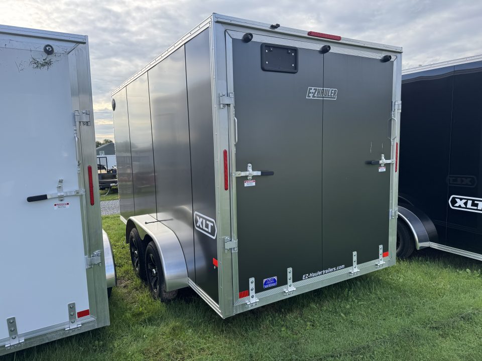 New 2026 E-Z Hauler EZEC7X14 XLT-P Cargo / Enclosed Trailer 71 SERIES 7'1" INTERIOR HEIGHT, .080 POLY CORE SIDES, FREE ALUMINUM WHEELS SALE ON NOW!