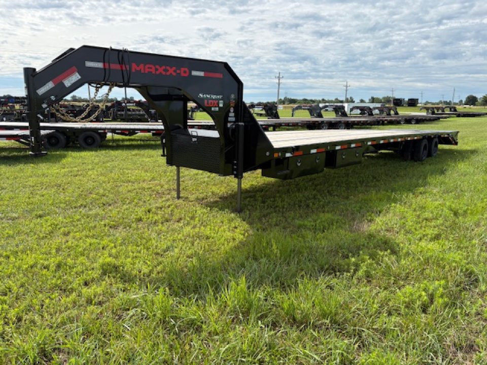New 2026 MAXX-D 102x40 Tandem 25.9K GN Flatbed Trailer W/ Hydro Jacks & Max Ramps