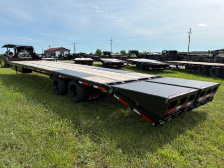 New 2026 MAXX-D 102x40 Tandem 25.9K GN Flatbed Trailer W/ Hydro Jacks & Max Ramps