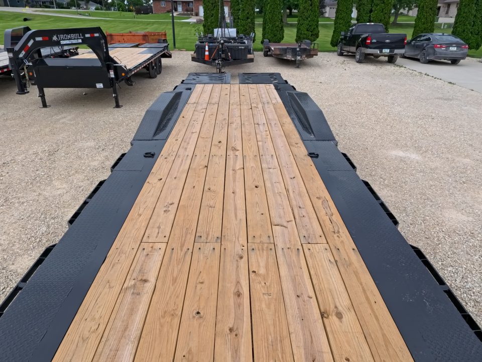 New 2027 Iron Bull 102" x 30' (26 +4) Equipment Trailer with 2)10K Spring Axles, Electric Brakes, 4' Self Cleaning Dove Tail and 4' Rampage Ramps