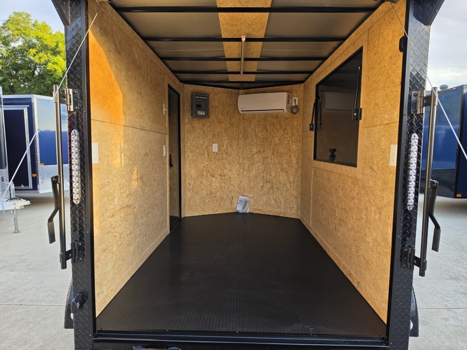 New 2026 New 6x10 TA Screwless Enclosed Vending Trailer | Blackout | Spoiler Package | 50 AMP Electric Pkg. w/Mini Split | .08 Polycor | Dexter Axles | 1145