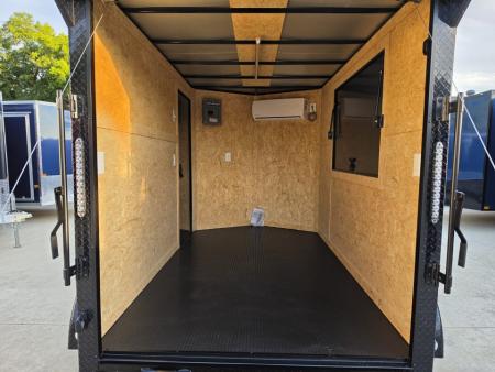 New 2026 New 6x10 TA Screwless Enclosed Vending Trailer | Blackout | Spoiler Package | 50 AMP Electric Pkg. w/Mini Split | .08 Polycor | Dexter Axles | 1145